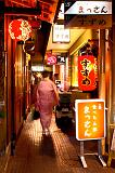 Geisha walking a alley in Gion District, Kyoto, Japan